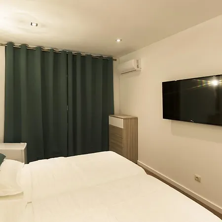 Casa de hóspedes Suites Deluxe